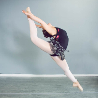 Young girl practicing one of our dance classes